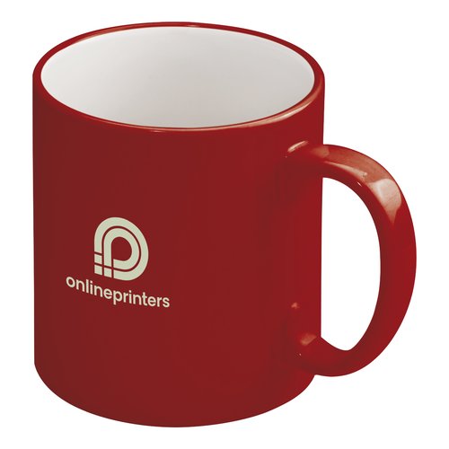 Rd keramisk mugg med handtag.
