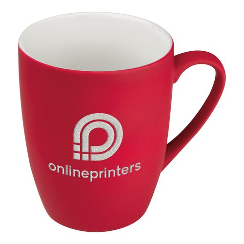 Rd keramisk mugg med handtag.