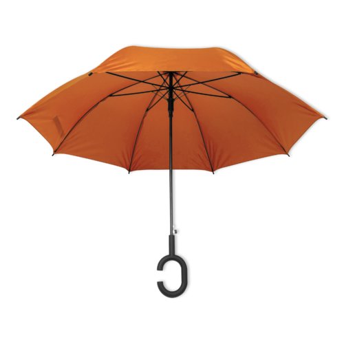 Orange paraply med specialhandtag.