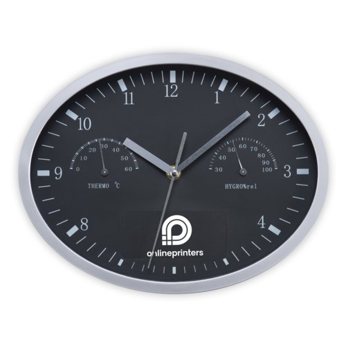 Svart vggklocka med termometer och hygrometer.