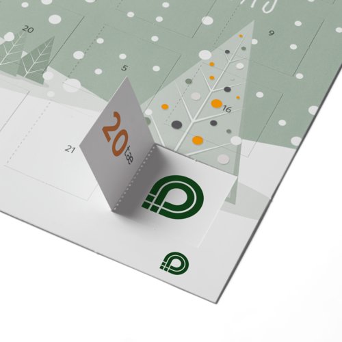 Adventskalender i papper med luckor att �ppna.